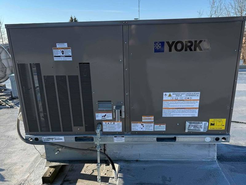 York packaged rooftop HVAC unit on a commercial building roof